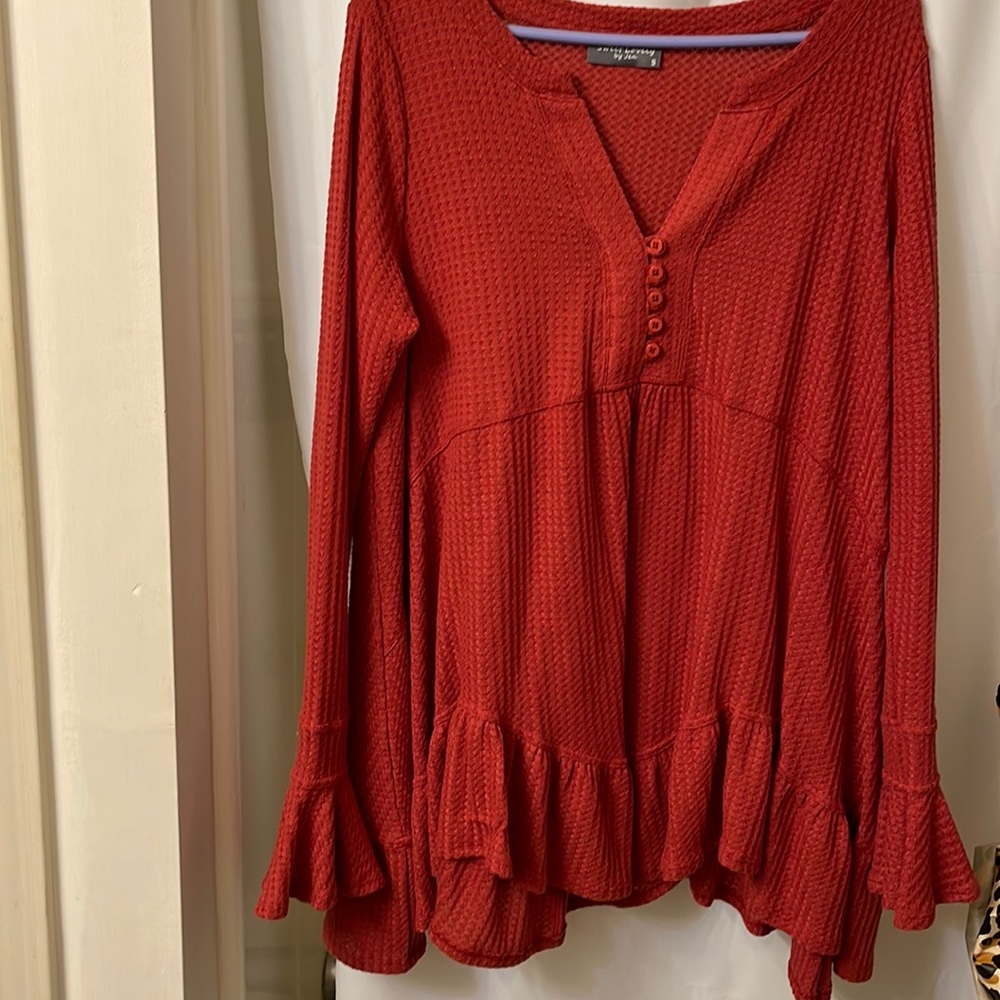 Woman’s long sleeve, waffle knit top